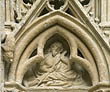 Panel 03:06 - Bearded and long-haired male figure holding a staff